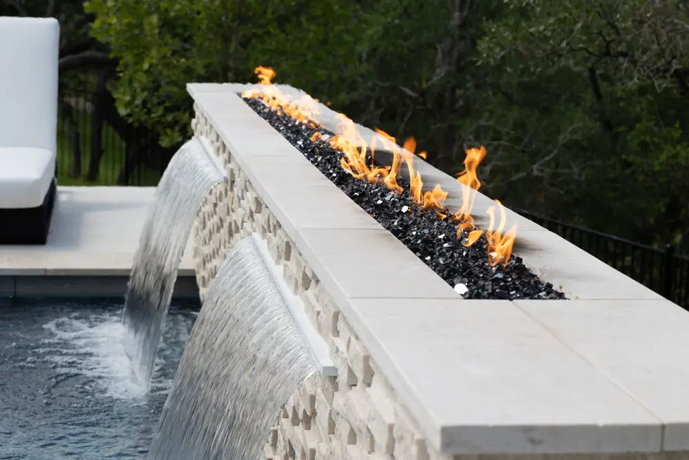 Fire feature closeup with serviced water spillway
