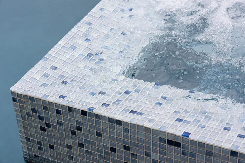 Clean pool tile edge after routine maintenance