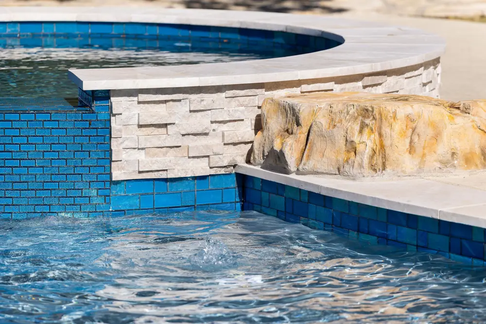 Tile and rock water feature detail