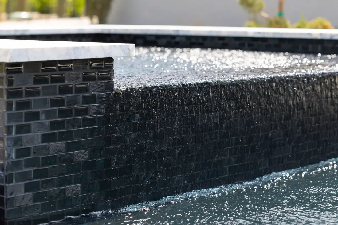 Tile spillway detail at a restored pool