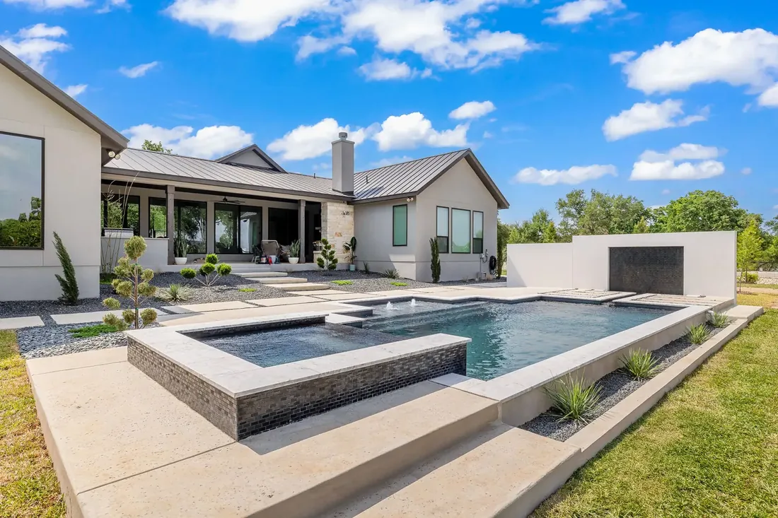 Modern pool courtyard with fresh plaster and clean tile